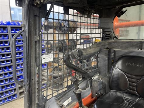 how to remove side widows on a kubota skid steer|bobcat side window cage removal.